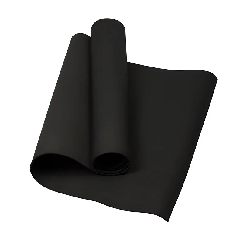 Black multifunctional exercise mat rolled out, ideal for stretching and recovery
