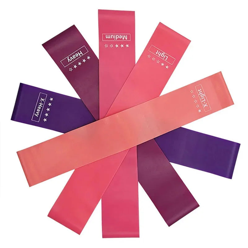Set of six colorful resistance bands in varying strengths arranged in a circle pattern