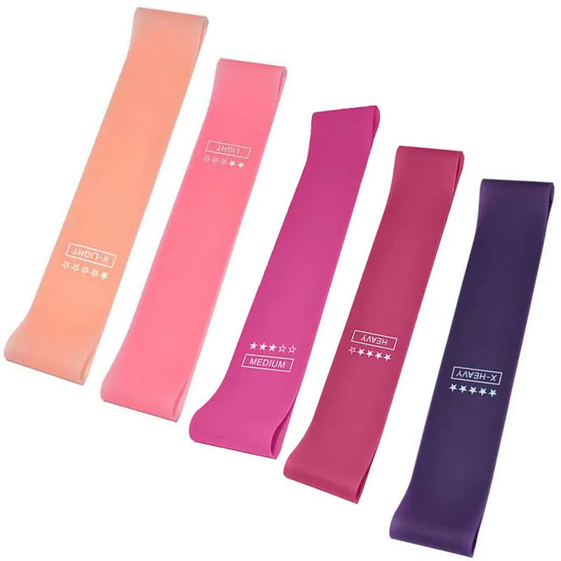 Set of five colorful resistance bands in different strengths for fitness and exercise