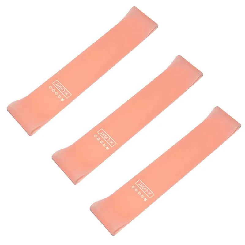 Set of three peach resistance bands for exercise and physical therapy